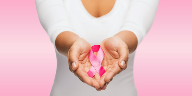 breast cancer pink ribbon hands